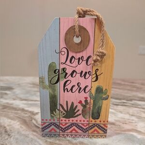 'Love Grows Here' Wood Sign